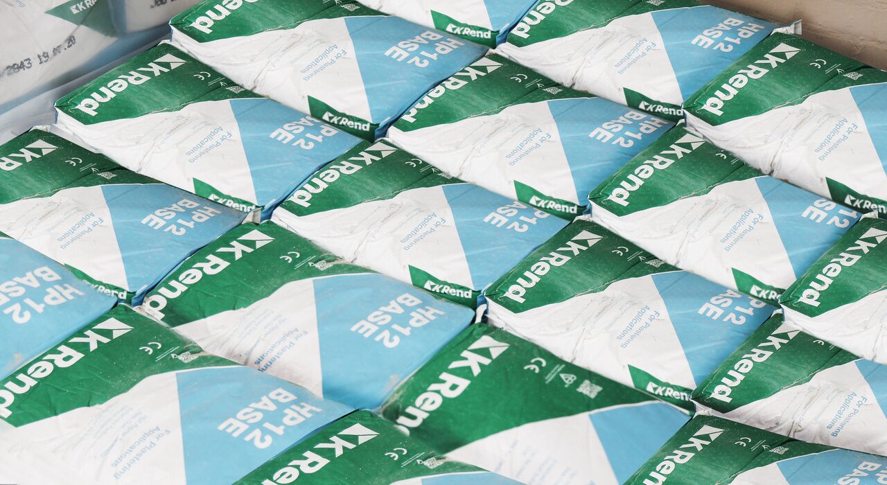 stack of K Rend HP12 Base render bags arranged in rows, supplied by a company specialising in external wall insulation and render systems