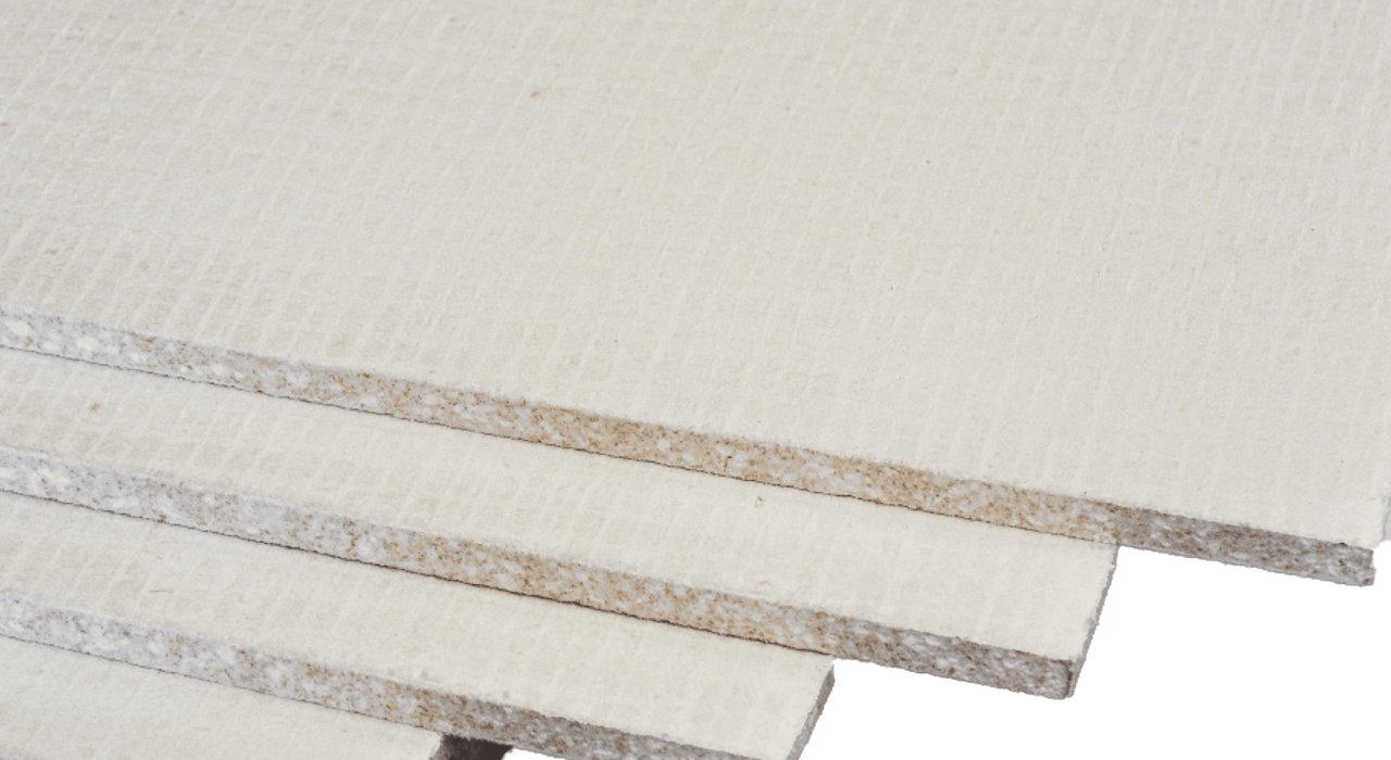 Close-up of laminated mineral wool fire protection boards with a reinforced surface. These boards are used in thermal and fire-safe applications, including external wall insulation systems. Available from EWI Store, they offer excellent fire resistance, dimensional stability, and ease of installation.