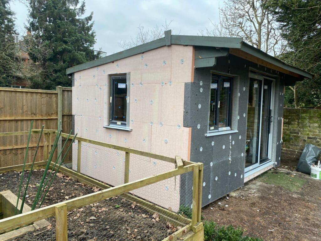 Kingspan K5 and EPS insulation installed on a shed in the garden